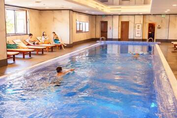 Фото номера Номер Делюкс для некурящих с 1 кроватью размера &quot;king-size&quot; Отель Holiday Inn - Aktau - Seaside г. Актау 7