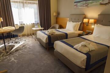 Фото номера Делюкс с 2 кроватями - Для некурящих Отель Holiday Inn - Aktau - Seaside г. Актау 5