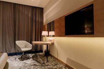 Фото номера Номер Делюкс для некурящих с 1 кроватью размера &quot;king-size&quot; Отель Holiday Inn - Aktau - Seaside г. Актау 5