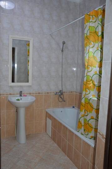 Фото номера Апартаменты с 2 спальнями Апартаменты Apartments on Plyazhnaya, 2 г. Актау 8