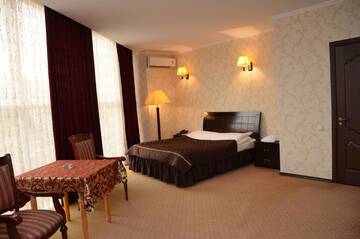 Фото номера Бюджетный двухместный номер с 1 кроватью Отель Golden Palace г. Актау 2