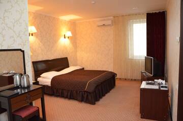 Фото номера Стандартный двухместный номер с 1 кроватью Отель Golden Palace г. Актау 3