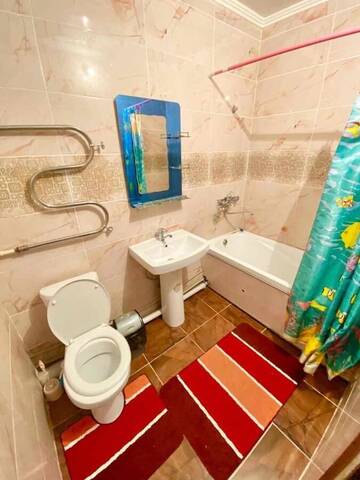Фото номера Апартаменты с 1 спальней Апартаменты Cozy 3-room apartment in Aktau г. Актау 11